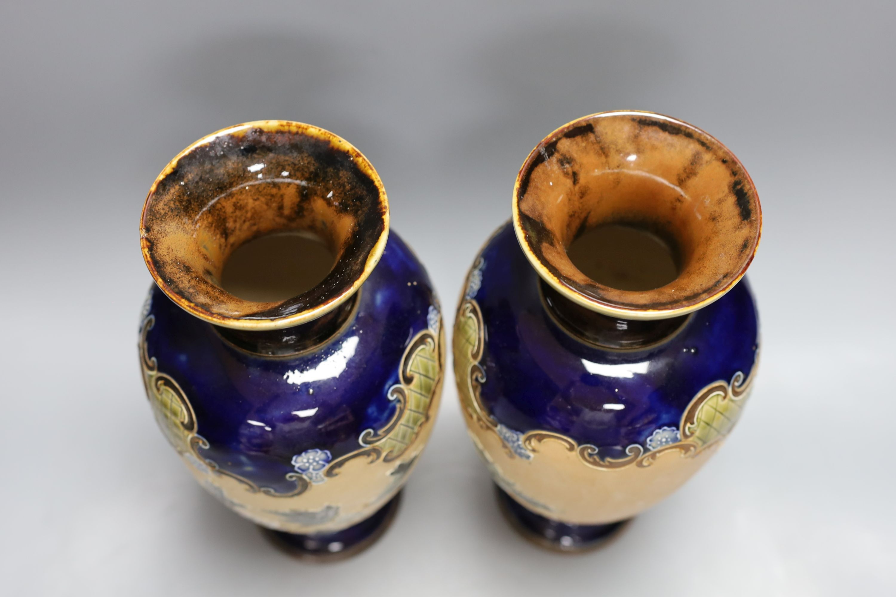 A pair of Doulton Lambeth vases, c.1900, 30cm tall